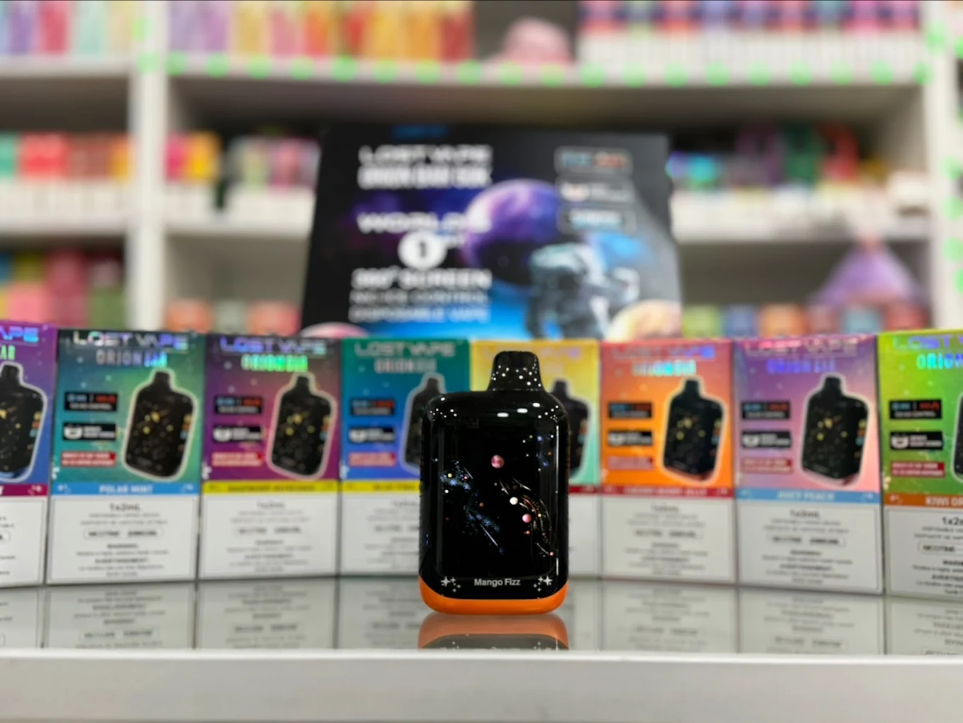 Selection of vape devices, refillable pods, and e-liquid flavors displayed in-store